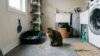cat sitting near litter box but not using it with accident on floor